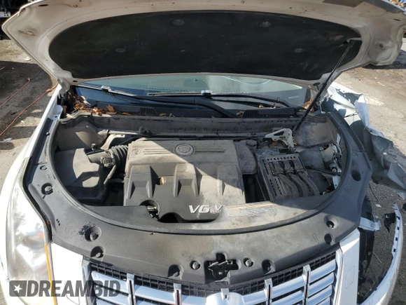 2014 Cadillac SRX Premium Collection z VIN 3GYFNGE31ES615593, wystawiony jako Copart lot #56785775 z przebiegiem 247 230 mil mil oraz Tytuł czysty. Historia ofert i sprzedaży dostępna na DreamBid. Obrazek 12.