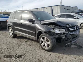 2010 Volkswagen Tiguan Wolfsburg Edition with VIN WVGAV7AX5AW002900, listed as a Copart auction lot 86214514 with 153,645 mi miles and Salvage title. Bid and sale history available at DreamBid. Image 4.