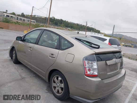 2004 Toyota Prius with VIN JTDKB20U240052320, listed as a IAAI auction lot 42023219 with 177,884 mi miles. Bid and sale history available at carsss.com. Image 3.