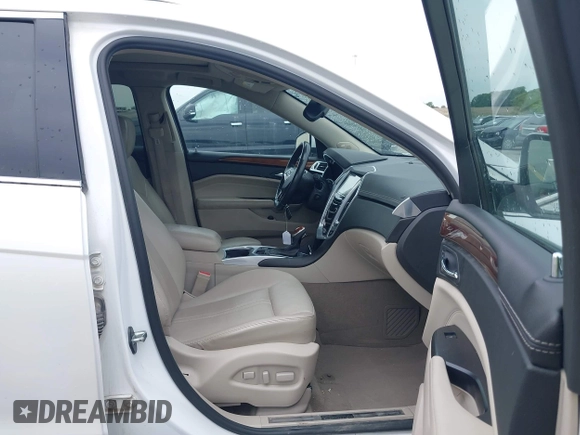 2013 Cadillac SRX Performance Collection z VIN 3GYFNHE35DS569528, wystawiony jako IAAI lot #42329652 z przebiegiem 97 184 mil mil oraz . Historia ofert i sprzedaży dostępna na DreamBid. Obrazek 5.