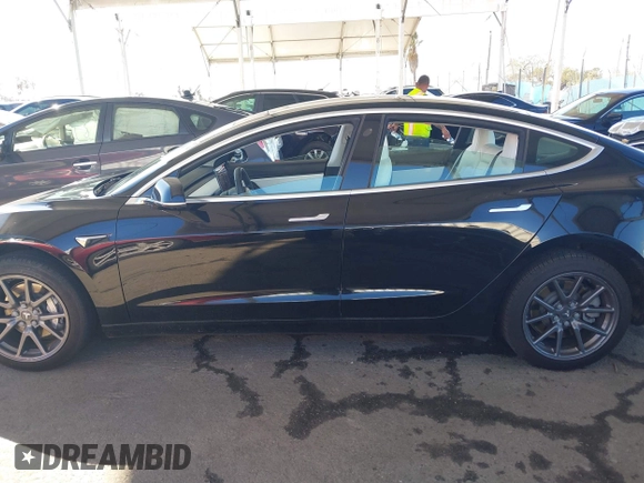 2020 Tesla Model 3 Standard Range Plus with VIN 5YJ3E1EA8LF661982, listed as a IAAI auction lot 41700109 with 30,271 mi miles and . Bid and sale history available at DreamBid. Image 13.