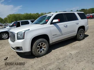 2016 GMC Yukon Denali z VIN 1GKS1CKJ7GR190015, wystawiony jako Copart lot #52724185 z przebiegiem 154 339 mil mil oraz Szkoda całkowita • Salvage title. Historia ofert i sprzedaży dostępna na DreamBid. Obrazek 1.