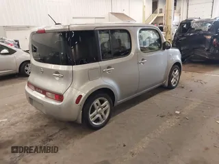 2009 Nissan Cube 1.8 SL with VIN JN8AZ28RX9T121918, listed as a IAAI auction lot 41517261 with 104,332 mi miles. Bid and sale history available at carsss.com. Image 4.