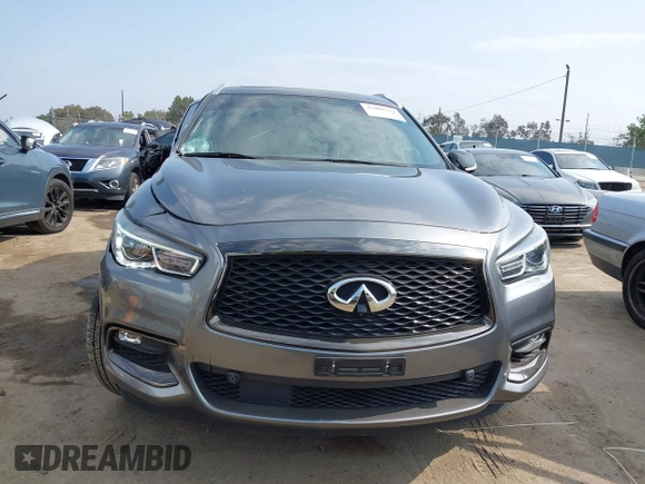 2020 Infiniti QX60 Luxe with VIN 5N1DL0MN2LC527549, listed as a IAAI auction lot 42408763 with 56,371 mi miles and . Bid and sale history available at DreamBid. Image 12.