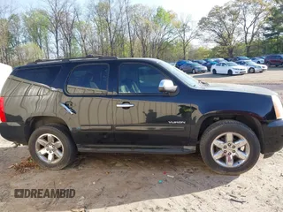 2011 GMC Yukon SLT with VIN 1GKS2CE02BR109155, listed as a IAAI auction lot 41925194 with 238,479 mi miles. Bid and sale history available at carsss.com. Image 12.