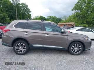 2016 Mitsubishi Outlander GT z VIN JA4JZ4AXXGZ002867, wystawiony jako IAAI lot #42327299 z przebiegiem 85 538 mil mil oraz . Historia ofert i sprzedaży dostępna na DreamBid. Obrazek 13.