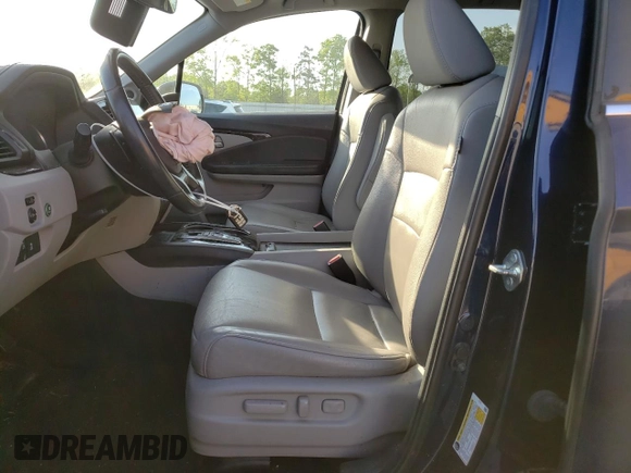 2019 Honda Pilot Touring 8-Passenger z VIN 5FNYF6H90KB000303, wystawiony jako Copart lot #52410585 z przebiegiem 129 190 mil mil oraz Szkoda całkowita • Salvage title. Historia ofert i sprzedaży dostępna na DreamBid. Obrazek 7.