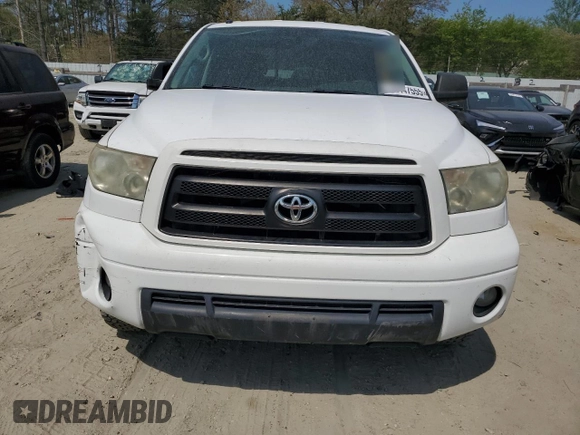 2010 Toyota Tundra 4WD Truck with VIN 5TFUY5F1XAX123787, listed as a Copart auction lot 54447555 with 242,821 mi miles and Clean Title. Bid and sale history available at carsss.com. Image 5.