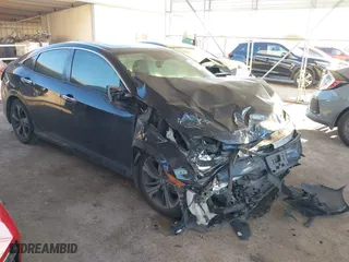 2017 Honda Civic Sedan Touring with VIN 19XFC1F97HE010119, listed as a IAAI auction lot 41310427 with 108,443 mi miles. Bid and sale history available at carsss.com. Image 1.