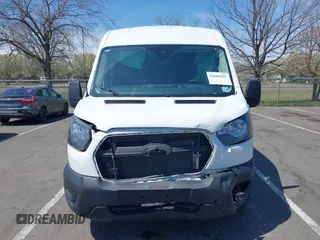 2024 Ford Transit Cargo z VIN 1FTBR1C84RKA39388, wystawiony jako IAAI lot #42069825 z przebiegiem 20 851 mil mil oraz . Historia ofert i sprzedaży dostępna na DreamBid. Obrazek 6.