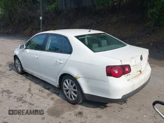2009 Volkswagen Jetta S z VIN 3VWHM71KX9M134604, wystawiony jako IAAI lot #42468306 z przebiegiem 109 509 mil mil oraz . Historia ofert i sprzedaży dostępna na DreamBid. Obrazek 3.