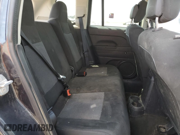 2016 Jeep Compass Sport z VIN 1C4NJCBA5GD543146, wystawiony jako Copart lot #57117905 z przebiegiem 100 569 mil mil oraz Szkoda całkowita • Salvage title. Historia ofert i sprzedaży dostępna na DreamBid. Obrazek 11.