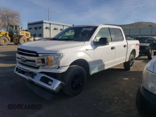 2019 Ford F-150 XL with VIN 1FTEW1E51KKE18332, listed as a Copart auction lot 86268344 with 141,566 mi miles and Salvage Title. Bid and sale history available at carsss.com. Image 1.