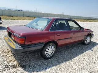 1991 Toyota Camry DLX z VIN 4T1SV21E4MU332100, wystawiony jako Copart lot #64645474 z przebiegiem 164 143 mil mil oraz Czysty tytuł • Clean title. Historia ofert i sprzedaży dostępna na DreamBid. Obrazek 3.