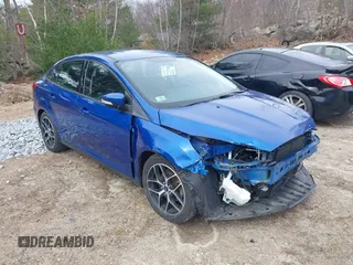 2018 Ford Focus SE z VIN 1FADP3F25JL255840, wystawiony jako IAAI lot #41852913 z przebiegiem 64 010 mil mil oraz . Historia ofert i sprzedaży dostępna na DreamBid. Obrazek 1.