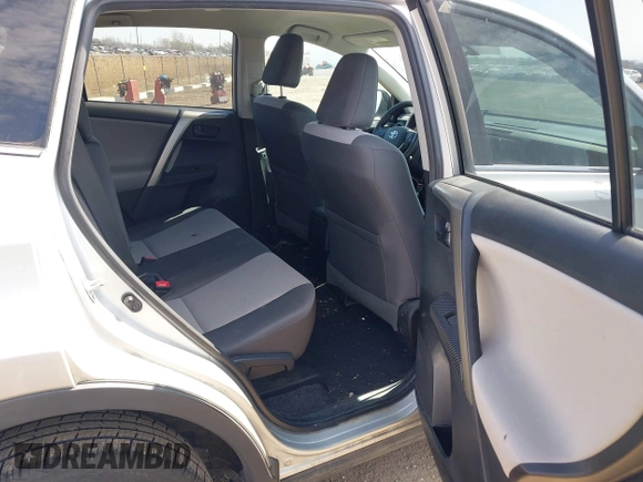 2014 Toyota RAV4 LE with VIN 2T3BFREV4EW136537, listed as a IAAI auction lot 42065728 with 211,039 mi miles and . Bid and sale history available at DreamBid. Image 8.