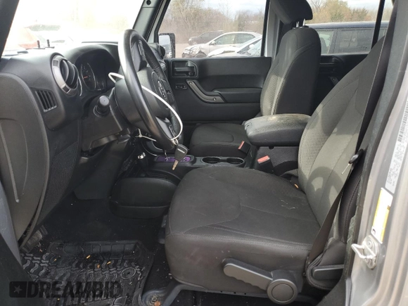 2018 Jeep Wrangler JK Unlimited Sport S with VIN 1C4BJWDG2JL908286, listed as a Copart auction lot 77313844 with 69,497 mi miles and Salvage Title. Bid and sale history available at carsss.com. Image 7.