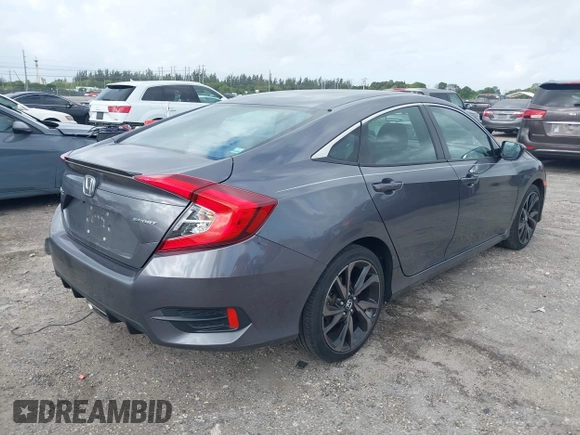 2019 Honda Civic Sport with VIN 2HGFC2F89KH563333, listed as a IAAI auction lot 41959217 with 66,068 mi miles and . Bid and sale history available at DreamBid. Image 4.