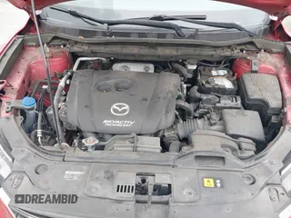 2016 Mazda CX-5 Touring with VIN JM3KE2CY3G0877185, listed as a IAAI auction lot 41729243 with 144,656 mi miles. Bid and sale history available at carsss.com. Image 10.