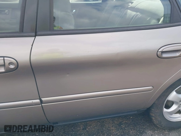 2003 Ford Taurus SE Standard with VIN 1FAFP53U63G125751, listed as a IAAI auction lot 41933803 with 196,710 mi miles. Bid and sale history available at carsss.com. Image 20.