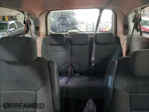 2010 Dodge Grand Caravan SXT with VIN 2D4RN5D15AR140564, listed as a Copart auction lot 52735825 with 187,744 mi miles and Salvage Title. Bid and sale history available at DreamBid. Image 10.