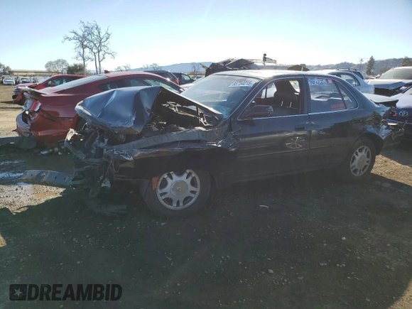 1994 Toyota Camry XLE with VIN JT2GK13E9R0057812, listed as a Copart auction lot 88704015 with 153,621 mi miles and Salvage Title. Bid and sale history available at carsss.com. Image 1.