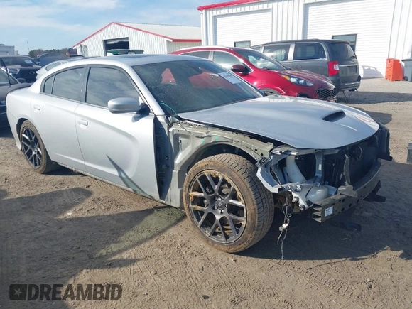 2019 Dodge Charger Scat Pack with VIN 2C3CDXGJXKH599632, listed as a IAAI auction lot 41666680 with 116,995 mi miles and . Bid and sale history available at DreamBid. Image 1.