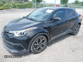 2018 Toyota C-HR XLE with VIN NMTKHMBX0JR008423, listed as a IAAI auction lot 42091445 with 124,811 mi miles. Bid and sale history available at carsss.com. Image 17.