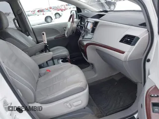 2013 Toyota Sienna XLE with VIN 5TDDK3DC2DS053559, listed as a IAAI auction lot 41299824 with 175,611 mi miles and . Bid and sale history available at DreamBid. Image 5.