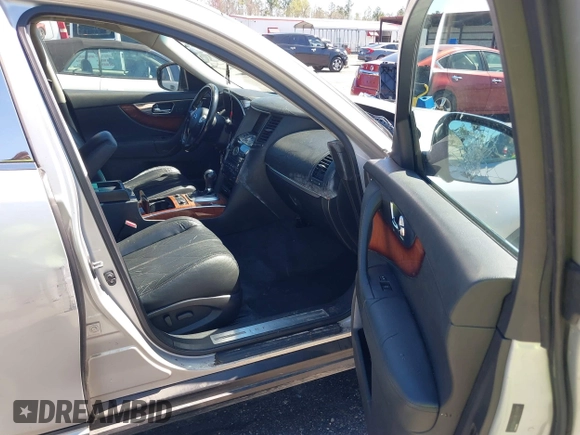 2010 Infiniti FX z VIN JN8AS1MU9AM802157, wystawiony jako IAAI lot #41699229 z przebiegiem 221 816 mil mil oraz . Historia ofert i sprzedaży dostępna na DreamBid. Obrazek 5.