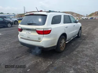 2013 Dodge Durango Crew with VIN 1C4RDJDG9DC667338, listed as a IAAI auction lot 42639559 with 137,020 mi miles and . Bid and sale history available at DreamBid. Image 4.