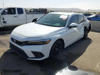 2023 Honda Civic Hatchback Sport Touring with VIN 19XFL1H8XPE001868, listed as a IAAI auction lot 41696926 with 37,051 mi miles. Bid and sale history available at carsss.com. Image 17.
