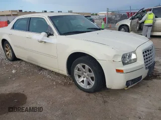 2007 Chrysler 300 Touring with VIN 2C3LA53G07H658041, listed as a IAAI auction lot 42014510 with 169,478 mi miles. Bid and sale history available at carsss.com. Image 1.