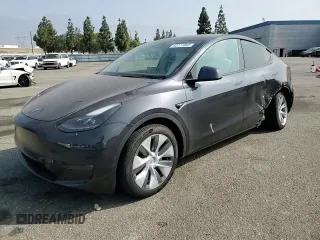 2024 Tesla Model Y Long Range with VIN 7SAYGDEE1RA266653, listed as a Copart auction lot 62277865 with 8,189 mi miles and Salvage title. Bid and sale history available at DreamBid. Image 14.