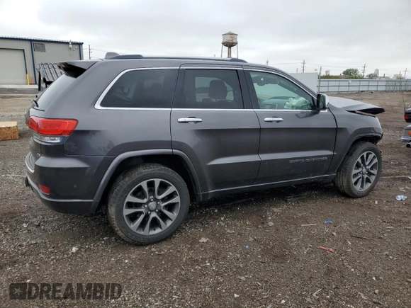 2017 Jeep Grand Cherokee Overland with VIN 1C4RJFCG8HC607872, listed as a Copart auction lot 57493195 with 164,478 mi miles and Salvage title. Bid and sale history available at DreamBid. Image 3.