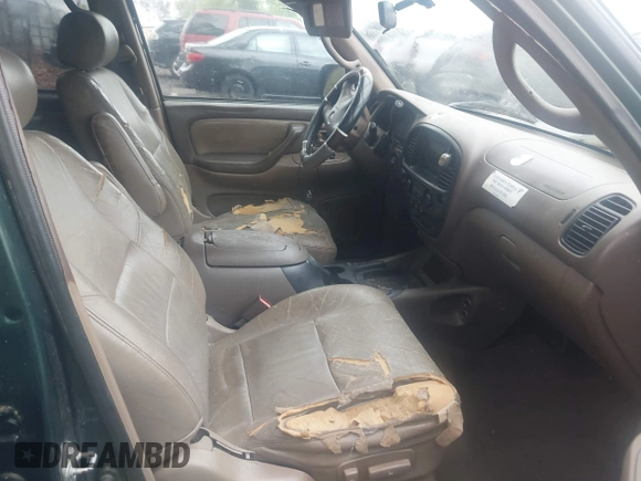 2002 Toyota Sequoia SR5 with VIN 5TDZT34A72S136628, listed as a IAAI auction lot 41978559 with 407,079 mi miles and . Bid and sale history available at DreamBid. Image 5.