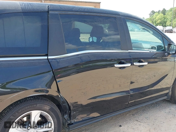 2019 Honda Odyssey EX-L with VIN 5FNRL6H76KB005145, listed as a IAAI auction lot 42075781 with 115,599 mi miles. Bid and sale history available at carsss.com. Image 6.