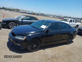 2018 Volkswagen Jetta SE Sport with VIN 3VWD17AJ2JM255162, listed as a IAAI auction lot 42506390 with 111,186 mi miles and . Bid and sale history available at DreamBid. Image 14.