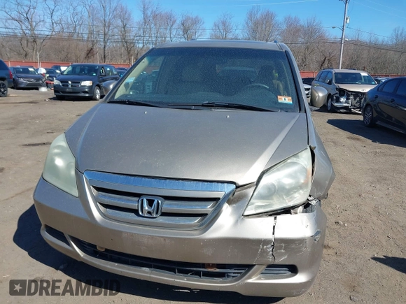 2006 Honda Odyssey EX-L z VIN 5FNRL38736B069969, wystawiony jako IAAI lot #41695311 z przebiegiem 196 218 mil mil oraz . Historia ofert i sprzedaży dostępna na DreamBid. Obrazek 17.