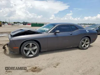2015 Dodge Challenger SXT with VIN 2C3CDZAG3FH811673, listed as a Copart auction lot 65060615 with 101,295 mi miles and Clean title. Bid and sale history available at DreamBid. Image 1.