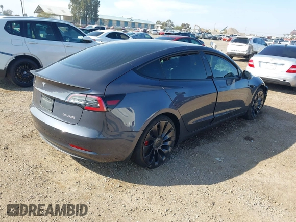 2022 Tesla Model 3 Performance with VIN 5YJ3E1ECXNF264830, listed as a IAAI auction lot 41625494 with Not Provided miles and . Bid and sale history available at carsss.com. Image 4.