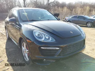 2014 Porsche Cayenne GTS z VIN WP1AD2A29ELA71349, wystawiony jako IAAI lot #41739741 z przebiegiem 64 969 mil mil oraz . Historia ofert i sprzedaży dostępna na DreamBid. Obrazek 1.