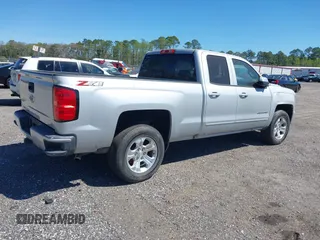 2018 Chevrolet Silverado 1500 LT with VIN 1GCVKREC9JZ335603, listed as a IAAI auction lot 41853399 with 152,460 mi miles and . Bid and sale history available at DreamBid. Image 4.