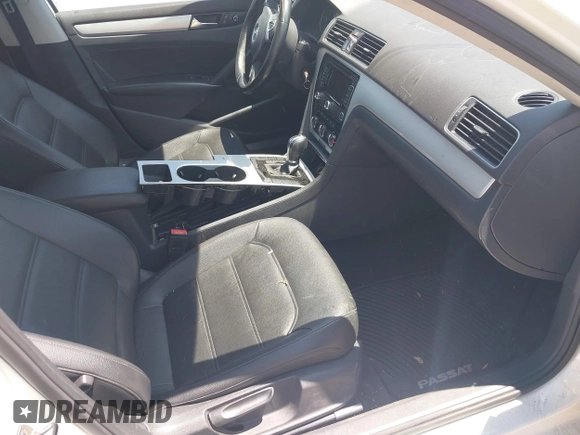 2013 Volkswagen Passat SE with VIN 1VWBN7A31DC056185, listed as a IAAI auction lot 42466848 with 95,484 mi miles and . Bid and sale history available at DreamBid. Image 5.