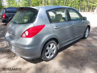 2010 Nissan Versa 1.8 SL with VIN 3N1BC1CP5AL357518, listed as a IAAI auction lot 42090152 with 149,821 mi miles. Bid and sale history available at carsss.com. Image 4.