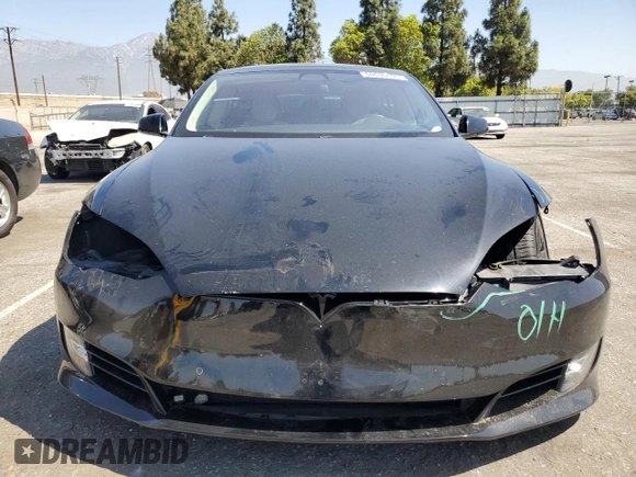 2017 Tesla Model S 100D z VIN 5YJSA1E28HF190858, wystawiony jako Copart lot #60690695 z przebiegiem 73 046 mil mil oraz Szkoda całkowita • Salvage title. Historia ofert i sprzedaży dostępna na DreamBid. Obrazek 5.