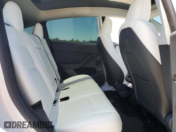 2024 Tesla Model Y Long Range with VIN 7SAYGDEE4RF054753, listed as a Copart auction lot 57989375 with 21,394 mi miles and Salvage title. Bid and sale history available at DreamBid. Image 10.