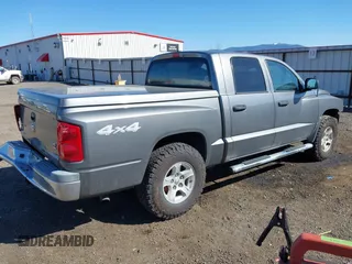 2005 Dodge Dakota SLT with VIN 1D7HW48N25S133725, listed as a IAAI auction lot 42074588 with 163,090 mi miles. Bid and sale history available at carsss.com. Image 4.
