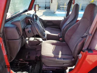 1999 Jeep Wrangler SE with VIN 1J4FY29P8XP483909, listed as a Copart auction lot 48679555 with 168,708 mi miles and Salvage title. Bid and sale history available at DreamBid. Image 7.