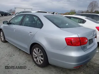 2013 Volkswagen Jetta Sedan SE with VIN 3VWDP7AJ3DM211027, listed as a IAAI auction lot 41849198 with 125,624 mi miles. Bid and sale history available at carsss.com. Image 3.